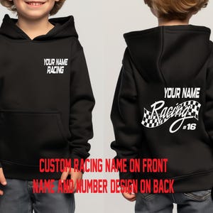 May include: Black hooded sweatshirt with a white racing design on the back. The design includes the text "Your Name Racing" and a checkered flag with the number 16. The front of the sweatshirt has the text "Your Name Racing" in white.