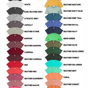 May include: A chart showing 24 different t-shirt colors, including black, white, dark heather grey, athletic grey, asphalt, heather stone, maroon, heather maroon, cardinal, heather cardinal, red, heather red, heather raspberry, heather mauve, heather neon pink, heather clay, heather autumn, heather mustard, heather dusty blue, heather deep teal, heather royal, heather navy, neon green, heather olive, heather grass green, heather forest, heather sea green, heather mint, coral, heather sunset, heather orange, and heather team purple.