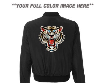 May include: Black bomber jacket with a colorful tiger face embroidered on the back.