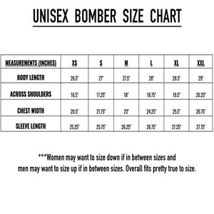 May include: Unisex bomber jacket size chart with measurements in inches for sizes XS, S, M, L, XL, and XXL. Measurements include body length, across shoulders, chest width, and sleeve length.
