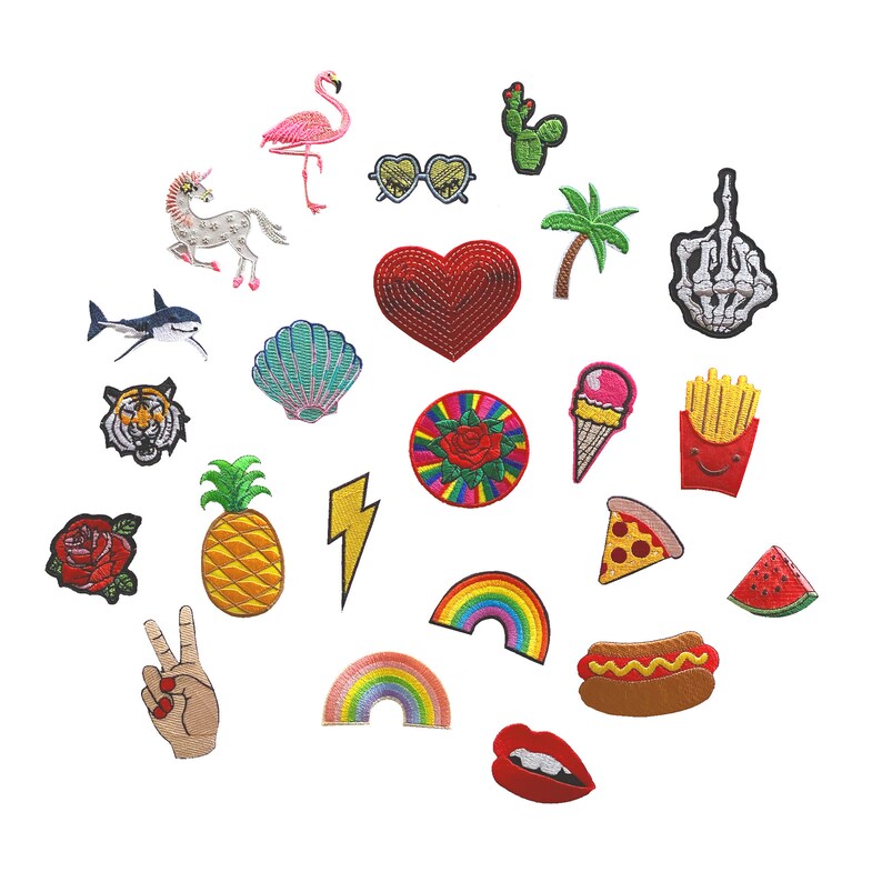 May include: A set of 18 colorful iron-on patches featuring various designs, including a flamingo, a pineapple, a rainbow, a heart, a seashell, a lightning bolt, a pizza slice, a watermelon slice, a french fry, an ice cream cone, a rose, a peace sign, a pair of sunglasses, a cactus, a palm tree, a tiger, a unicorn, and a skeleton hand.