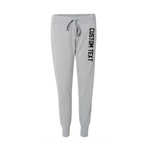 May include: Gray sweatpants with a black drawstring and the text "CUSTOM TEXT" printed vertically on the right leg.
