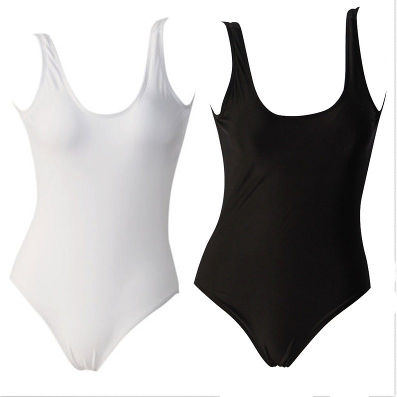 May include: Two sleeveless one-piece swimsuits, one white and one black.
