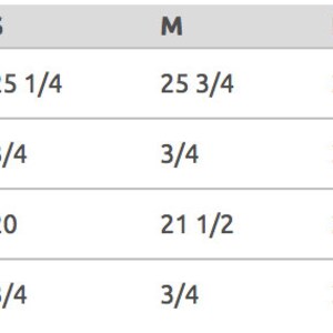 May include: Size chart for a garment with measurements in inches for sizes S, M, L, XL, and 2XL. Measurements include body length front, body length tolerance, body width, and body width tolerance.