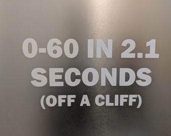 May include: White text on a silver background reads "0-60 in 2.1 seconds (off a cliff)"