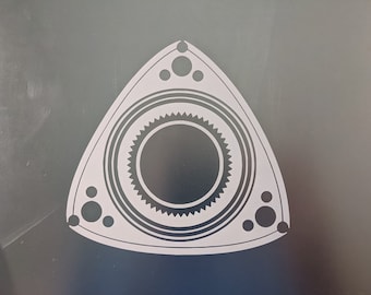 May include: A white rotary engine symbol with a black center and a black gear design. The symbol is shaped like a triangle with rounded edges.
