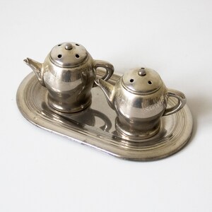 The Taste Of Talking vintage 1991 Henk Stallinga salt and pepper shakers unused in original box part of art collection MoMA New York