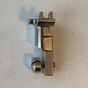 Bernina OLD Style Adapter for Bernina Sewing Machine Part attaches sewing machine foot or sewing machine accessory needing to screw on side