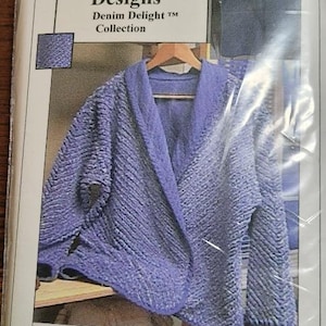 May include: A pattern for a reversible shawl, collar jacket, and/or vest. The pattern is called "CASU Designs Denim Delight Collection" and the pattern number is 0985.