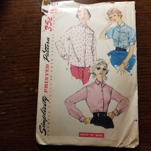 May include: A vintage Simplicity sewing pattern for a blouse. The pattern number is 4854, size 12, bust 30. The pattern is printed on each pattern piece. The pattern shows three different styles of blouses, one with a floral print, one with stripes, and one with a solid color. The text "Simple to Make" is printed at the bottom of the pattern.