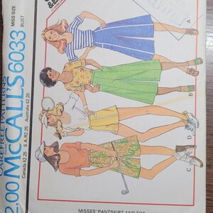 May include: A sewing pattern for a pantskirt and top, featuring three women wearing different versions of the garment. The pattern is called "McCall's 6033" and is labeled "Quick & Easy".