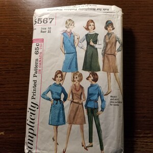 May include: Simplicity sewing pattern number 6567 for a dress with a vest. The pattern is for size 10 and bust 31. The pattern is printed on a white background with a blue, green, and brown color scheme. The pattern is for a dress with a vest and skirt. The pattern is also suitable for suede.