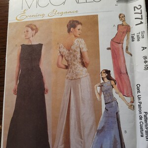 May include: McCall's Evening Elegance sewing pattern for a dress with a skirt that can be made in three different styles. The pattern is for sizes 6-8-10. The pattern includes instructions for making the dress.