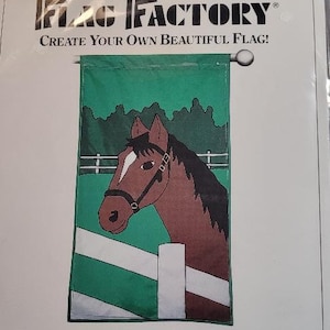 May include: A Flag Factory pattern for a horse flag. The pattern is designed for flags that finish at 28 inches by 48 inches. The pattern includes instructions for sewing the flag. The image shows a brown horse with a white stripe on its face, looking to the left. The horse is standing in a green field with a white fence.