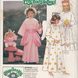 May include: A vintage sewing pattern for Cabbage Patch Kids doll clothes. The pattern includes instructions for making two outfits: a pink fairy dress and a white angel dress. The pattern is from Butterick and is number 3490.