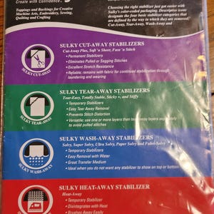 May include: A Sulky Stabilizer Sampler package containing sixteen 8x10 inch stabilizers. The packaging features four color-coded sections: purple for Cut-Away, green for Tear-Away, blue for Wash-Away, and red for Heat-Away, with descriptive text.