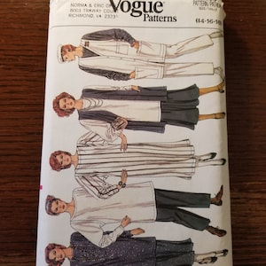 May include: Vogue Patterns sewing pattern number 9238 for sizes 14-16-18. The pattern includes instructions and diagrams for making four different outfits. The outfits include a striped dress, a white dress with a black belt, a black and white patterned dress, and a black and white striped top with black pants.