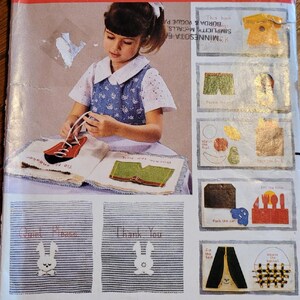 May include: A vintage craft pattern from Butterick, featuring a girl sewing a book with various scenes. The pattern is for a craft project titled "One, Two, See What I Can Do" and includes instructions for making a book with different activities for children.