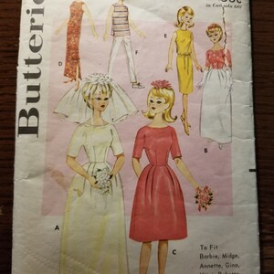 May include: Vintage sewing pattern for making doll clothes. The pattern is for a wedding dress, a pink dress, and several other outfits. The pattern is for dolls like Barbie, Midge, Annette, Gina, Mitzi, Babette, Kay, and many other similar dolls. The pattern number is 3088 and the price is 50 cents.