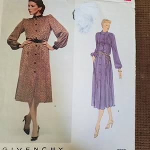May include: Vintage Vogue Paris Original sewing pattern for a dress by Givenchy. The pattern is for a long-sleeved dress with a button-up front and a belt. The pattern is for sizes 8-16 and is in excellent condition. The pattern number is 2200.