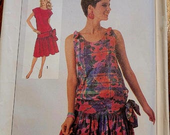 Patrón de vestido vintage sin cortar de Simplicity para mujer, tallas 10, 12 y 14, con cintura baja, número 7556.