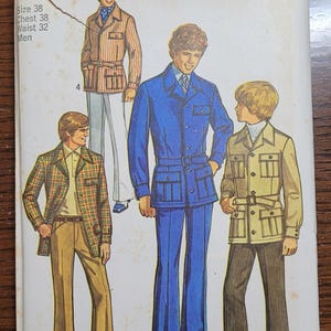 May include: A vintage Simplicity sewing pattern for men's clothing. The pattern shows three different styles of jackets and pants. The pattern number is 9123 and the price is $1.00.
