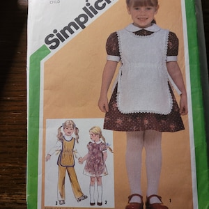Vintage early 80&#39;s UNCUT childs size 3 dress, apron and pull on pants pattern 9817