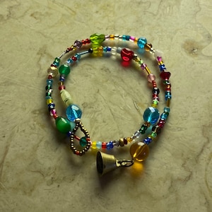 Colorful beaded boho suncatcher strands, hippie decor