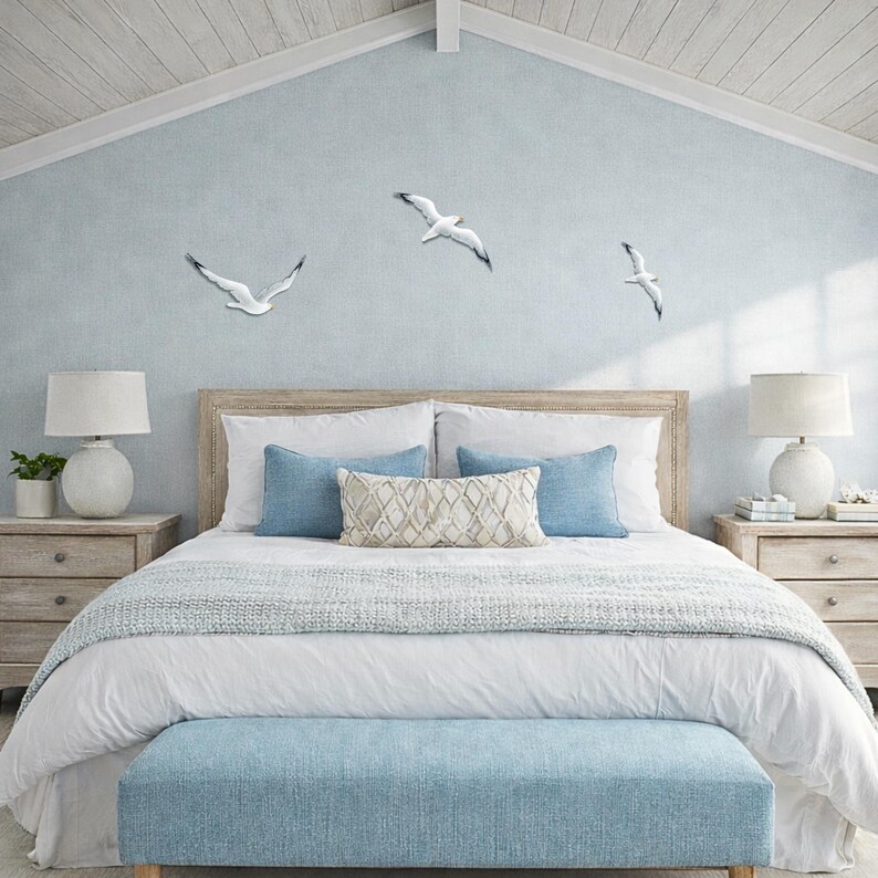Beach wall art with flock of 3 flying seagulls as large wall installation