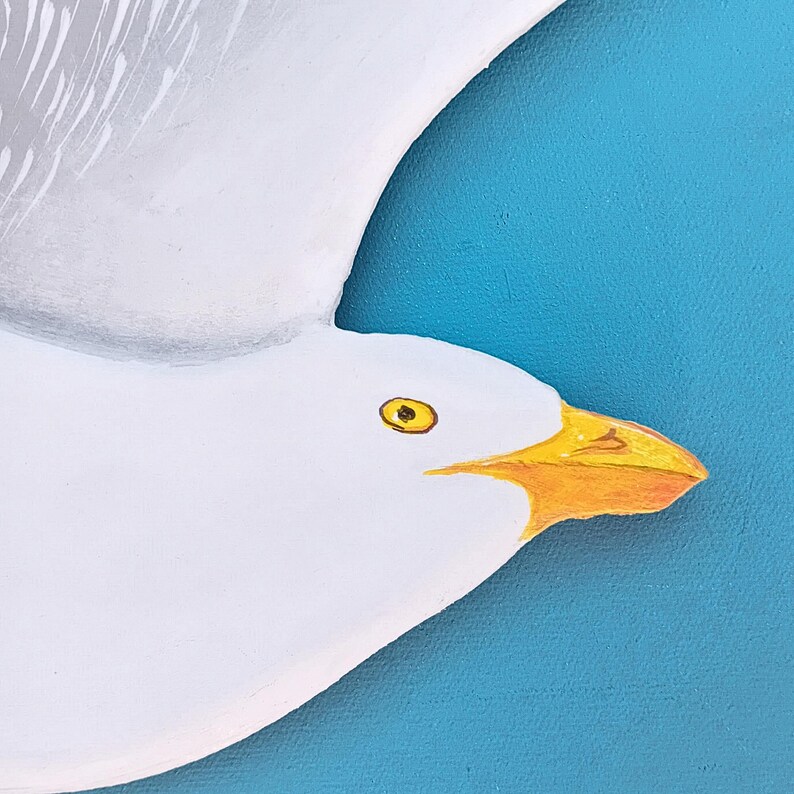 Hand painted wooden seagull sculpture detail for coastal wall art