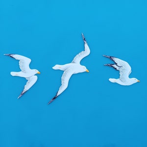 A Flock of Three Wooden White Seagulls in Flight for Wall Decor - Coastal & Beach House Wall Art - Ocean Bird Nursery Gift - Seabird Artwork