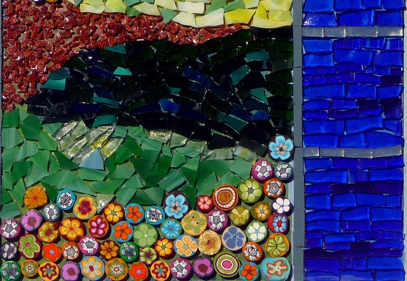 May include: A mosaic artwork featuring a landscape scene with a blue sky, green grass, and a red hill. The bottom of the artwork is decorated with colorful flowers.