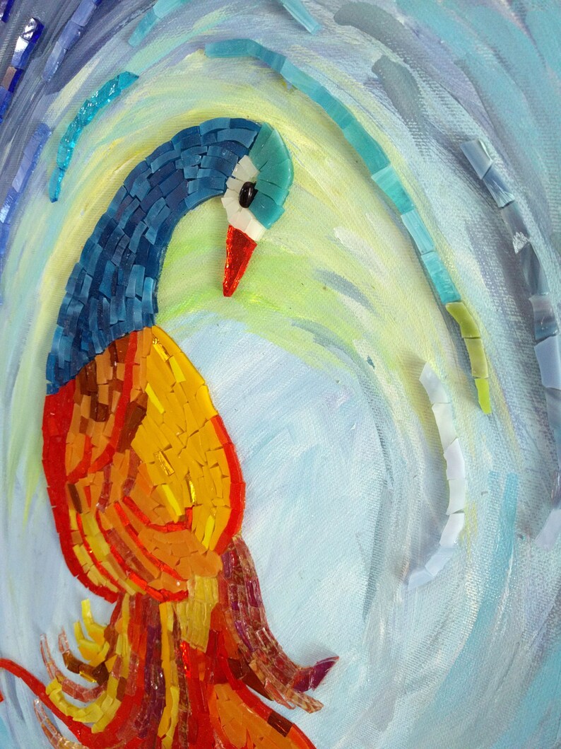 May include: A mosaic artwork of a peacock with blue and green feathers and a bright orange and yellow tail. The peacock is set against a light blue background with swirling brushstrokes.