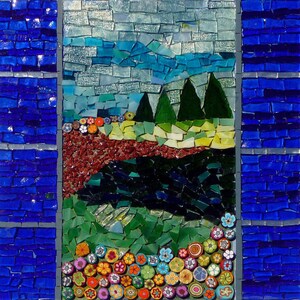 May include: A mosaic artwork depicting a landscape scene with a blue sky, green trees, and a river. The bottom of the artwork features a row of colorful flowers.