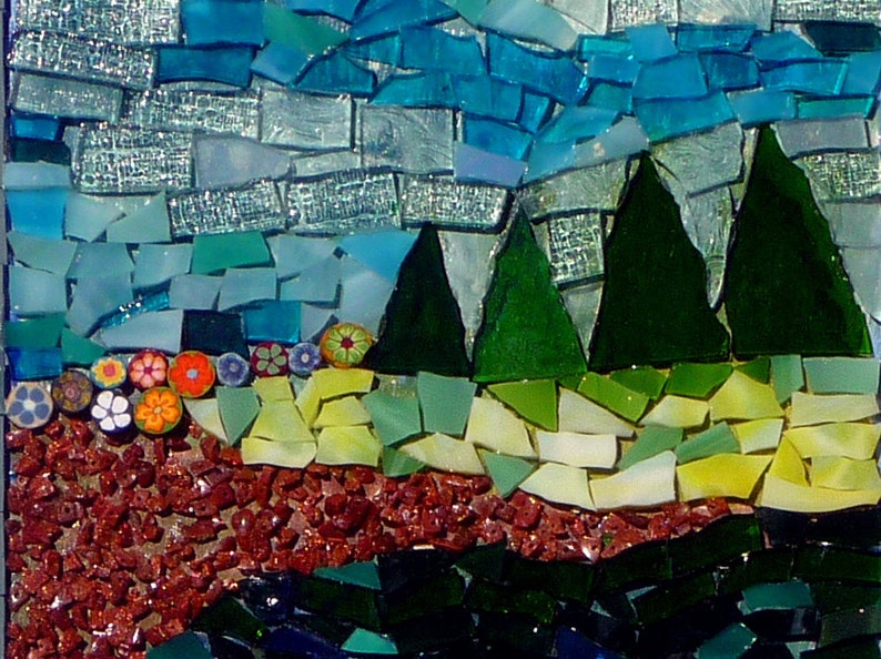 May include: A mosaic artwork depicting a landscape with a blue sky, green trees, and a red-brown ground. The sky is made of small blue and white glass tiles. The trees are made of green glass tiles. The ground is made of small red-brown glass tiles.