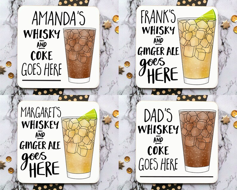 May include: Four white square coasters with black lettering and illustrations of glasses of whiskey and coke or ginger ale. The coasters feature personalized names like "Amanda's Whiskey and Coke Goes Here", "Frank's Whiskey and Ginger Ale Goes Here", "Margaret's Whiskey and Ginger Ale Goes Here", and "Dad's Whiskey and Coke Goes Here".