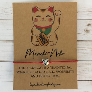 May include: A set of three ceramic mugs with a speckled, matte finish. The mugs are in shades of cream, light gray, and dark gray. Each mug has a simple, minimalist design, perfect for coffee or tea.