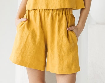 Linen shorts for woman in Sunny Yellow color. Elastic waist simple soft and natural shorts with pockets available in 47 colors.