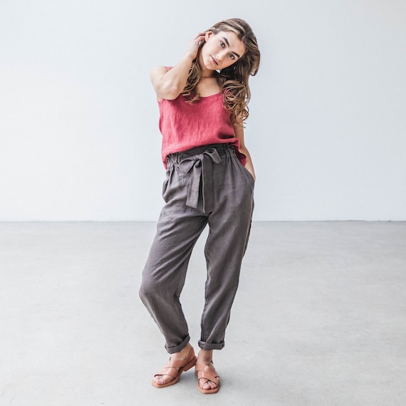 Linen pants with pockets. High waisted tapered woman's trousers with elastic waistband and the bow. Available in 47 colors