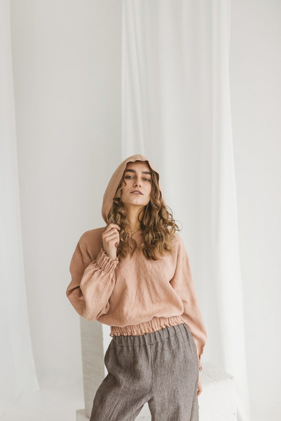 Linen hoodie for woman in Dusty peach color. Long sleeve linen top. Oversize hooded top available in 47 color.