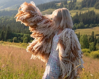 Huge Shaggy Jacket in Off-White/Camel. Fringe Cardigan with Long Sleeves. Shag Cardigan with Long Fringe. Oversized Shaggy Coat