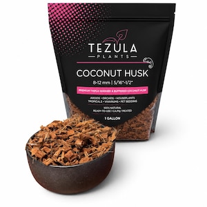May include: A black bag of Tezula Plants coconut husk with pink accents, labeled 8-12 mm and 5/16-1/2 inch, containing 1 gallon of triple-washed, buffered coconut husk. A dark bowl filled with the brown, fibrous coconut husk sits in front of the bag.
