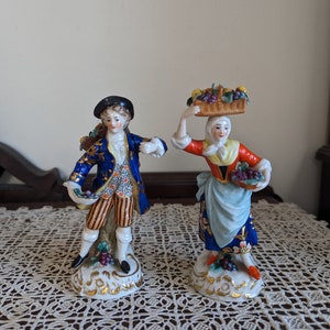 Antique Set of two lovely antique European figurines with fruit baskets