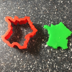 Cortador de galletas o fondant con forma de Francia: herramienta para hornear con forma de mapa del país para viajes, fiestas temáticas francesas y eventos culturales.