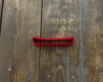 Cortador con forma de canoa