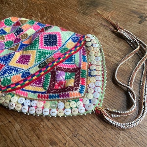 Vintage Bolivian Ch’ullo hat with button and bead embellishments 1980