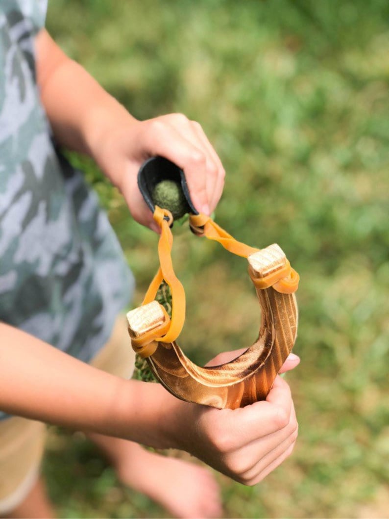 montessori inspired kids wooden sling shot with wool felt balls and muslin bag, fun play outside busy toy image 4