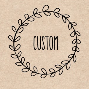 May include: A black line drawing of a circular wreath of leaves encircles the word "CUSTOM" in a handwritten font. The background is a light tan color.