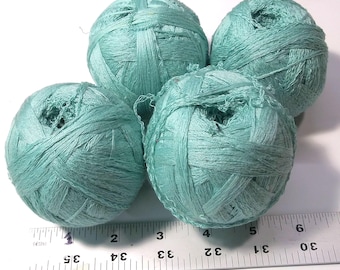 Reclaimed Cotton and Natural Fiber Blend Yarns From Unraveled Secondhand Sweaters