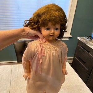 Doll that walks and store talks and closes its eyes